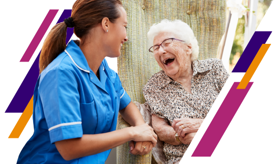 An international social care worker talking with an elderly person.